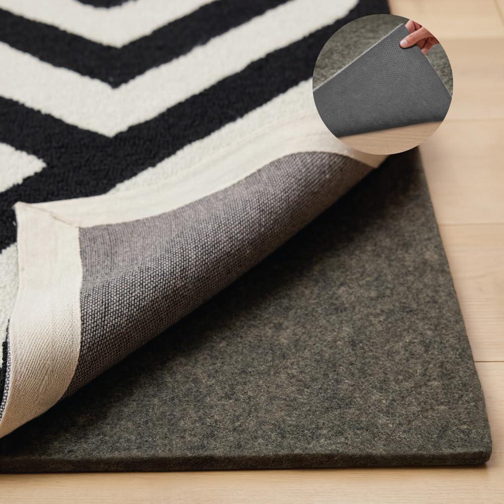 imageGORILLA GRIP Felt and Natural Rubber Stay in Place Slip Resistant Rug Pad 18in Thick 5x7 FT Protective Padding Under Area Rugs Cushioned Gripper Pads Carpet Runners Hardwood Floors Protection7 x 10 Rectangular
